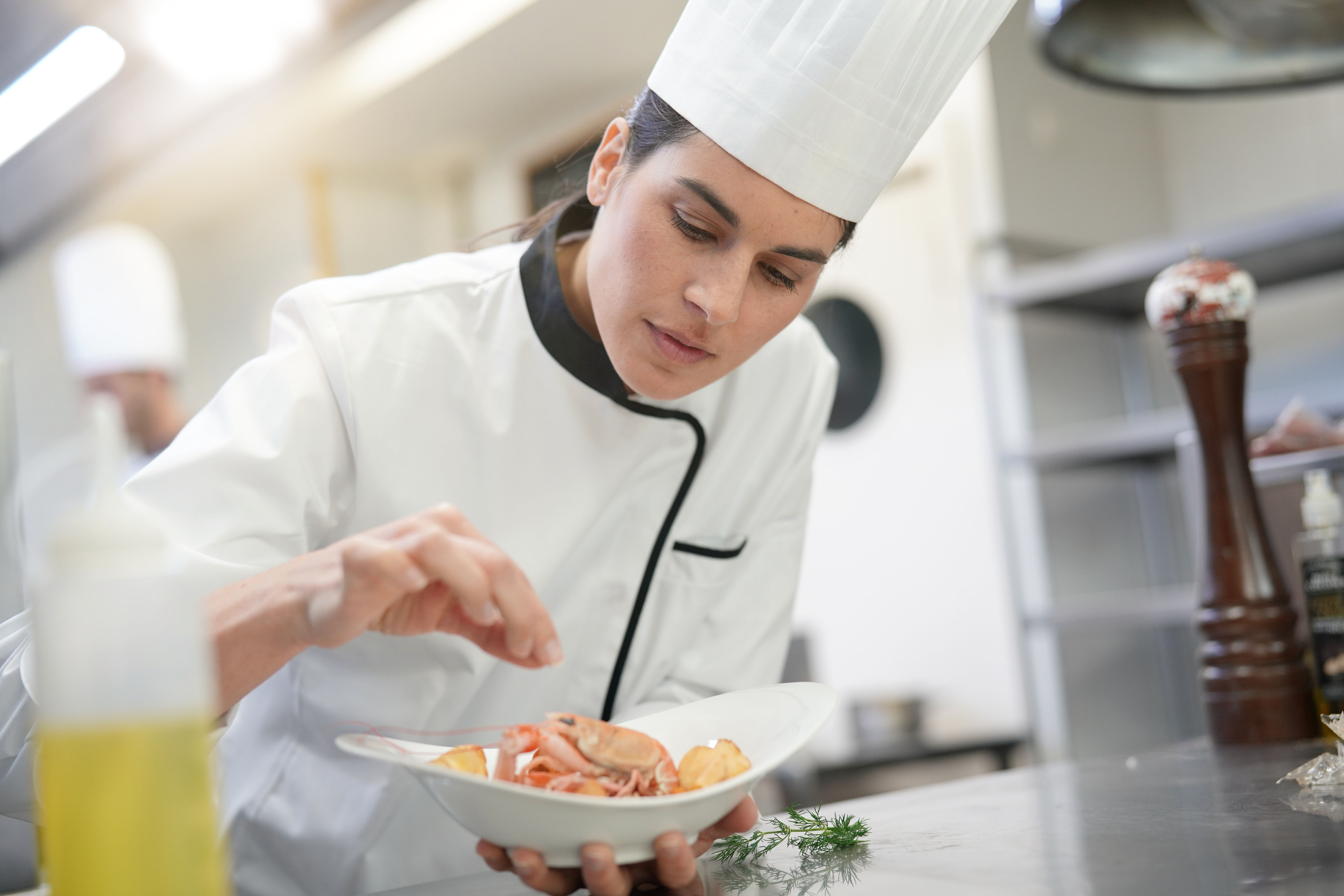 Gastronomie Köchin AdobeStock